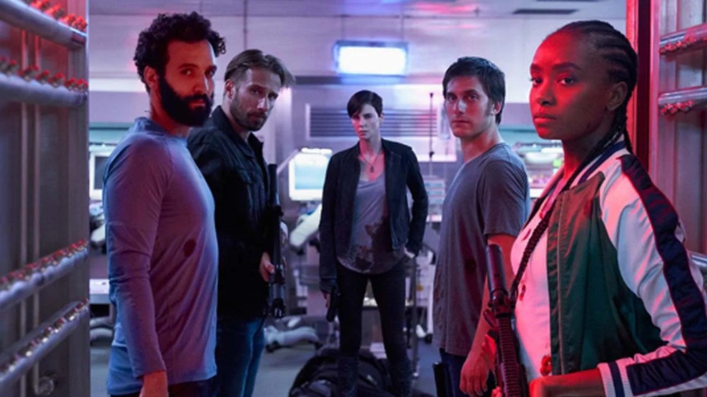 Baseado na HQ de Greg Rucka, The Old Guard acompanha Andy e um grupo de mercenários que precisa esconder o poder a imortalidade — Foto: Reprodução/IMDb