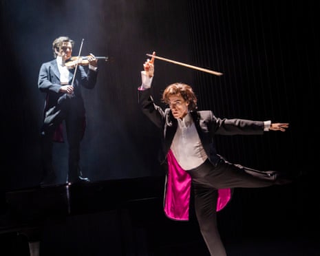 Steven McRae dances before a screen showing Vasko Vassilev playing violin