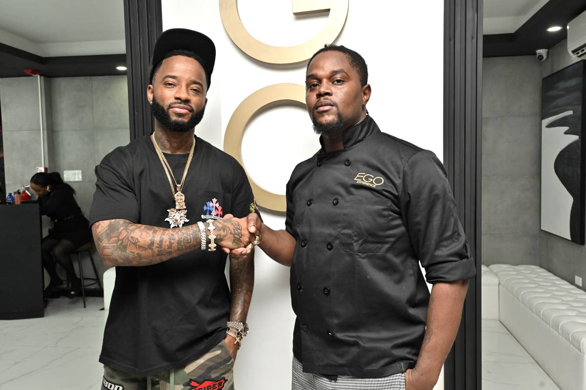 Jermaule ‘Nino’ Adair (left), co-owner of EGO and Raldeno Francis, lead chef at EGO, share the lens for a quick picture.