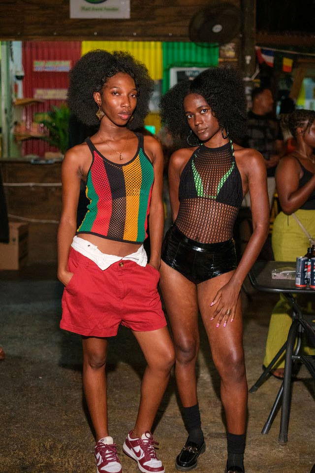 Models Leonie Campbell (left) and Roginea Dixon make a stylish entrance.