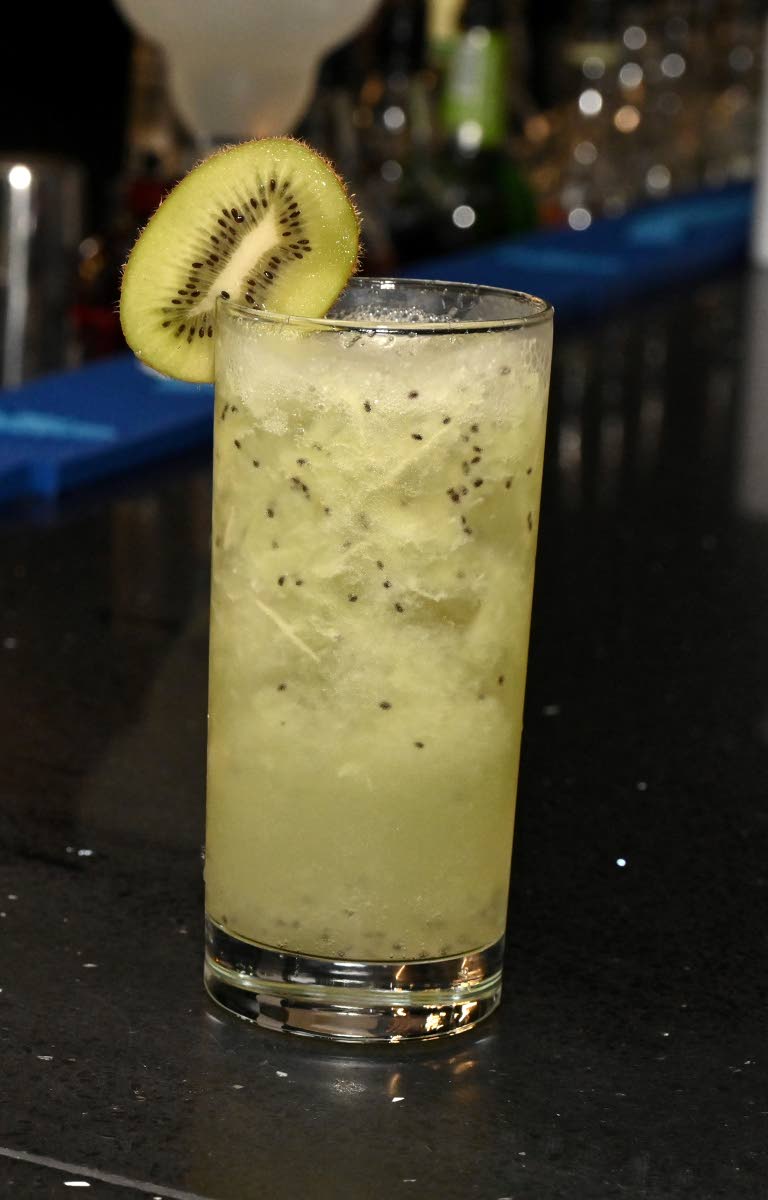 Kiwi paradise is made with kiwi, sweet and sour, vodka and Ting.